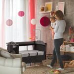 6-in-1 Foldable Baby Crib with Activity Center Diaper Changing Table - Image 13