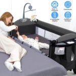 6-in-1 Foldable Baby Crib with Activity Center Diaper Changing Table - Image 10